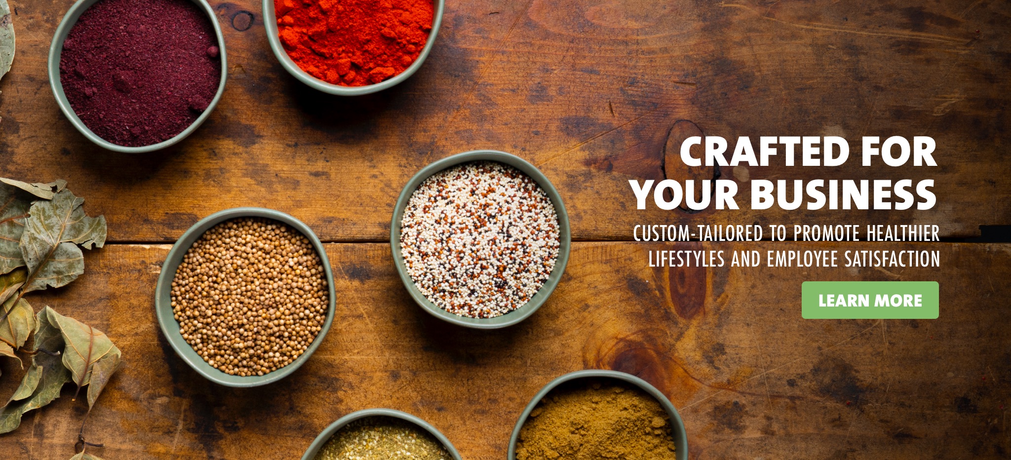 Bowls of spices. Caption: Crafted For Your Business Custom-Tailored To Promote Healthier Lifestyles And Employee Satisfaction